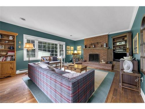 63 Mountain Street, St. Catharines, ON - Indoor Photo Showing Living Room With Fireplace