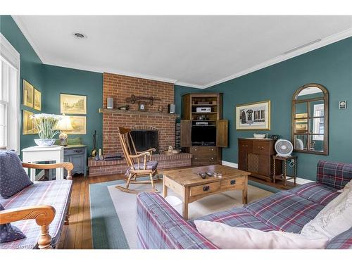 63 Mountain Street, St. Catharines, ON - Indoor Photo Showing Living Room With Fireplace