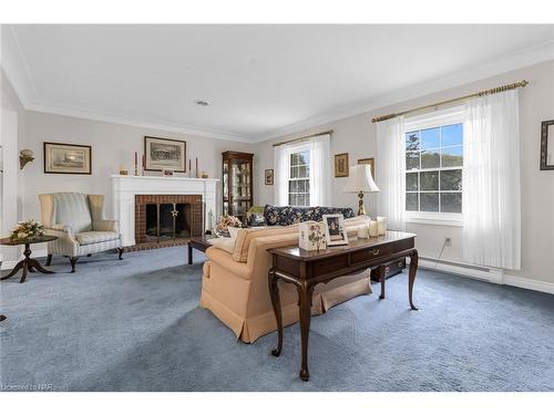 63 Mountain Street, St. Catharines, ON - Indoor Photo Showing Living Room With Fireplace