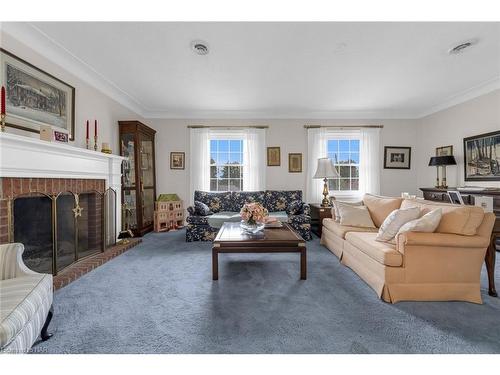 63 Mountain Street, St. Catharines, ON - Indoor Photo Showing Living Room With Fireplace