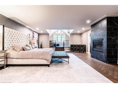 76 Adriatic Boulevard, Stoney Creek, ON - Indoor Photo Showing Bedroom With Fireplace