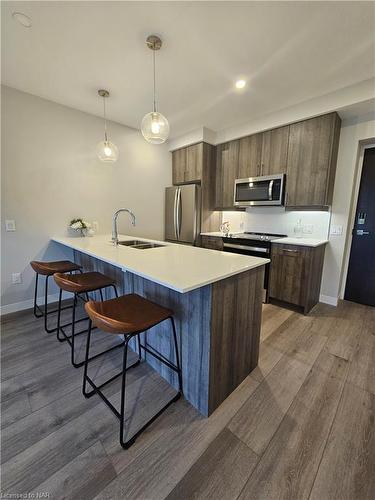 703-118 West Street, Port Colborne, ON - Indoor Photo Showing Kitchen With Upgraded Kitchen