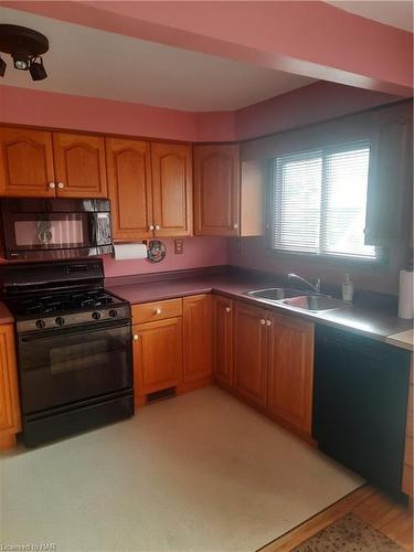 169-171 Merritt Street, Welland, ON - Indoor Photo Showing Kitchen With Double Sink