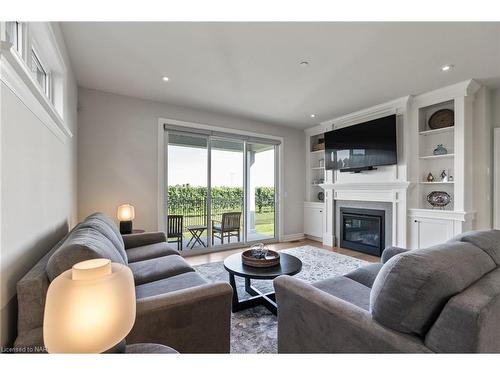 4-1849 Four Mile Creek Road, Niagara-On-The-Lake, ON - Indoor Photo Showing Living Room With Fireplace