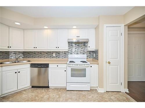 306B-1061 Vansickle Road N, St. Catharines, ON - Indoor Photo Showing Kitchen With Double Sink