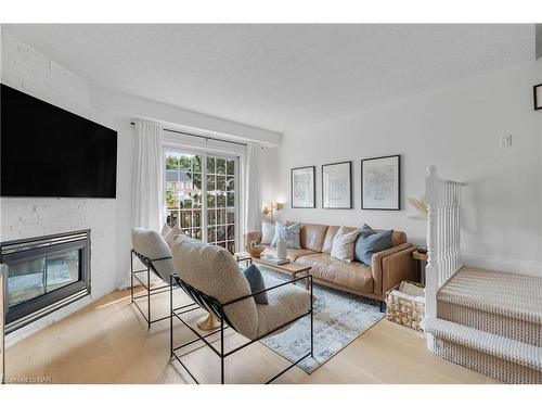 72-3480 Upper Middle Road, Burlington, ON - Indoor Photo Showing Living Room With Fireplace