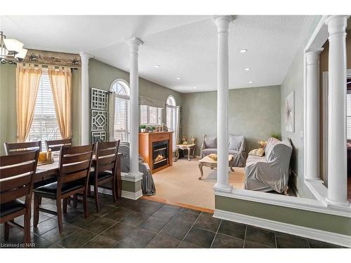 162 Cole Crescent, Niagara-On-The-Lake, ON - Indoor Photo Showing Dining Room With Fireplace