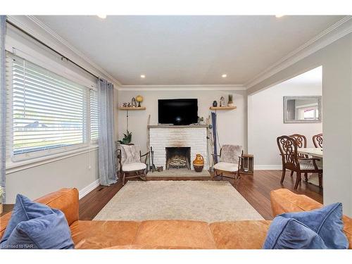 12 Corbett Avenue, St. Catharines, ON - Indoor Photo Showing Living Room With Fireplace