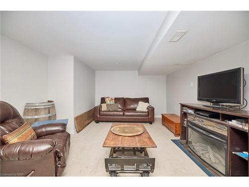 12 Corbett Avenue, St. Catharines, ON - Indoor Photo Showing Living Room With Fireplace