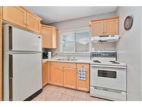 6143 Main Street, Niagara Falls, ON - Indoor Photo Showing Kitchen With Double Sink