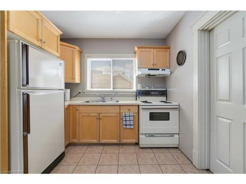 6143 Main Street, Niagara Falls, ON - Indoor Photo Showing Kitchen With Double Sink