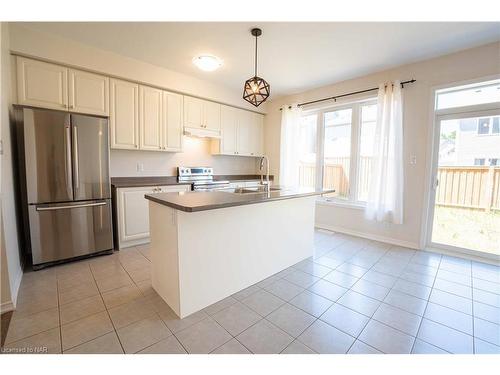 8767 Sourgum Avenue, Niagara Falls, ON - Indoor Photo Showing Kitchen With Double Sink