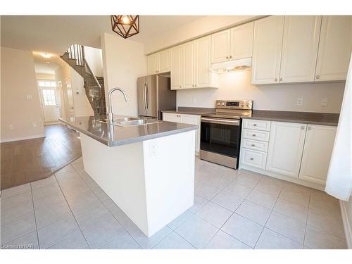 8767 Sourgum Avenue, Niagara Falls, ON - Indoor Photo Showing Kitchen With Double Sink