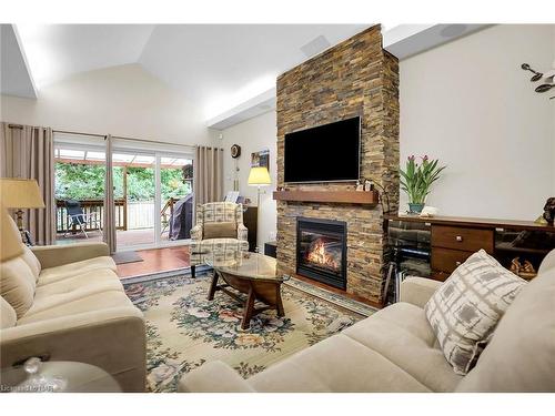 Th 9-678 Line 2 Road, Virgil, ON - Indoor Photo Showing Living Room With Fireplace