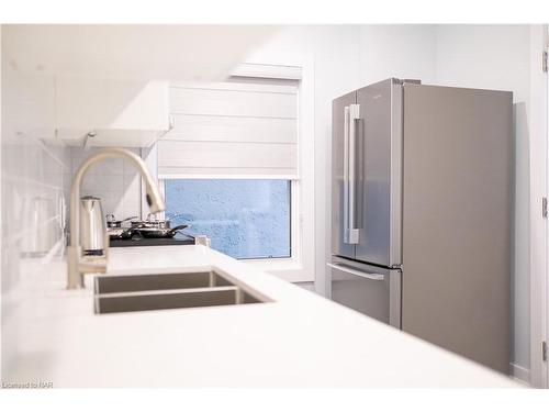 Main Level- Left-26 Duke Street, St. Catharines, ON - Indoor Photo Showing Kitchen With Double Sink