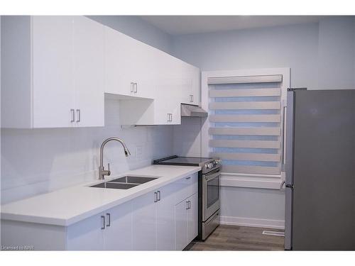 Main Level- Left-26 Duke Street, St. Catharines, ON - Indoor Photo Showing Kitchen With Double Sink