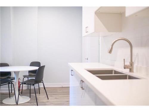 Main Level- Left-26 Duke Street, St. Catharines, ON - Indoor Photo Showing Kitchen With Double Sink