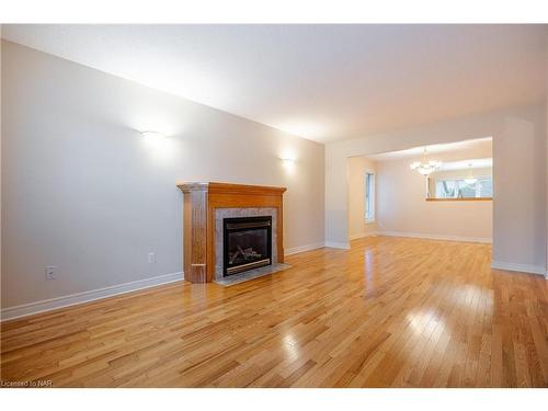 65 Arbour Glen Drive, St. Catharines, ON - Indoor Photo Showing Living Room With Fireplace