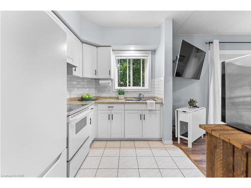 103-5753 Morrison Street, Niagara Falls, ON - Indoor Photo Showing Kitchen With Double Sink