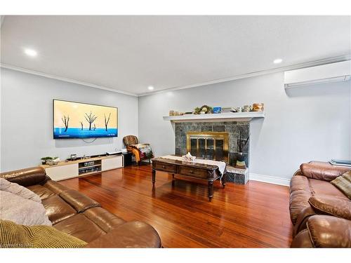 1900 Garrison Road, Fort Erie, ON - Indoor Photo Showing Living Room With Fireplace