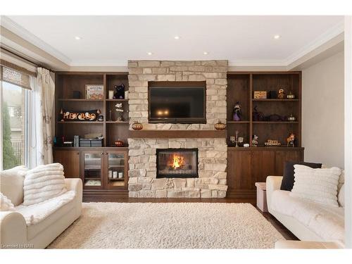 8829 Joseph Court, Niagara Falls, ON - Indoor Photo Showing Living Room With Fireplace