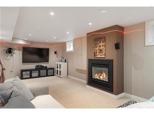 8829 Joseph Court, Niagara Falls, ON - Indoor Photo Showing Living Room With Fireplace