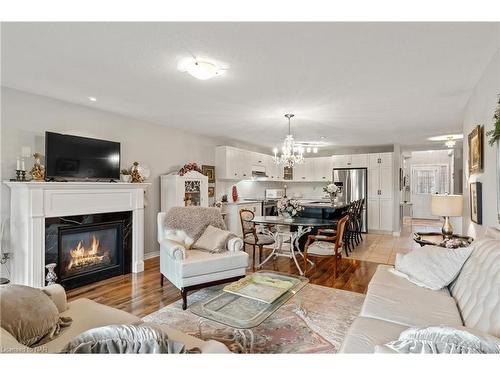 11-77 Avery Crescent, St. Catharines, ON - Indoor Photo Showing Living Room With Fireplace