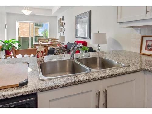 225-8111 Forest Glen Drive, Niagara Falls, ON - Indoor Photo Showing Kitchen With Double Sink