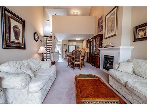 15-4300 Kalar Road, Niagara Falls, ON - Indoor Photo Showing Living Room With Fireplace