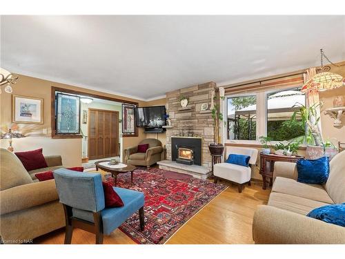 8 St Louis Place, St. Catharines, ON - Indoor Photo Showing Living Room With Fireplace