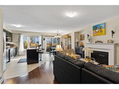 8096 Blue Ash Lane, Niagara Falls, ON - Indoor Photo Showing Living Room With Fireplace