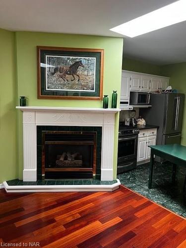 48 Mcdonald Avenue, Thorold, ON - Indoor Photo Showing Living Room With Fireplace