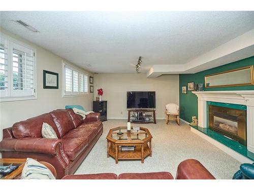 21 Windermere Court, Welland, ON - Indoor Photo Showing Living Room With Fireplace