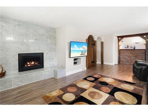 75 Aquadale Drive, St. Catharines, ON - Indoor Photo Showing Living Room With Fireplace