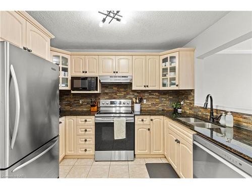 7-10 Stonecairn Drive, Cambridge, ON - Indoor Photo Showing Kitchen With Stainless Steel Kitchen With Double Sink