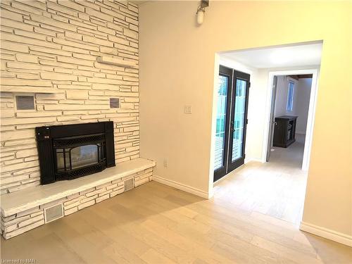 73 Jacobson Avenue, St. Catharines, ON - Indoor Photo Showing Other Room With Fireplace