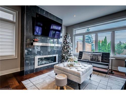 8 Tuscany Court, St. Catharines, ON - Indoor Photo Showing Living Room With Fireplace