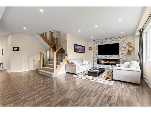 4500 Eclipse Way, Niagara Falls, ON - Indoor Photo Showing Living Room With Fireplace