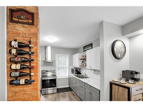 15 Jones Street, St. Catharines, ON - Indoor Photo Showing Kitchen With Double Sink