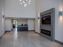 241-50 Herrick Avenue, St. Catharines, ON  - Indoor Photo Showing Living Room With Fireplace 