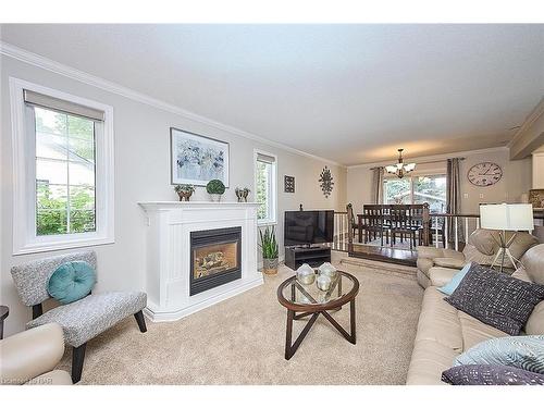 3378 Saint Patrick Avenue, Niagara Falls, ON - Indoor Photo Showing Living Room With Fireplace