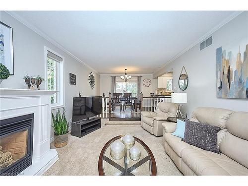 3378 Saint Patrick Avenue, Niagara Falls, ON - Indoor Photo Showing Living Room With Fireplace