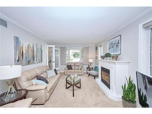 3378 Saint Patrick Avenue, Niagara Falls, ON - Indoor Photo Showing Living Room With Fireplace