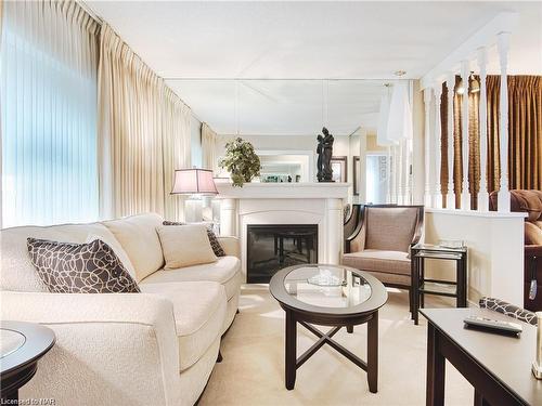 111 Lake Street, St. Catharines, ON - Indoor Photo Showing Living Room With Fireplace