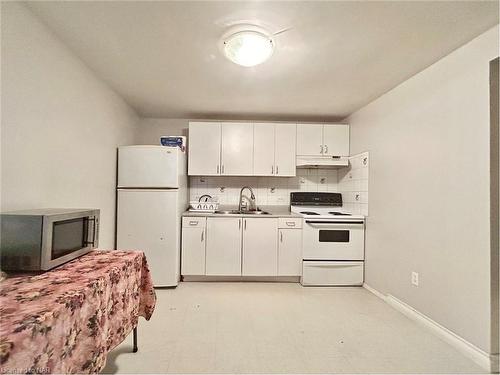 Lower-22 Augusta Avenue, St. Catharines, ON - Indoor Photo Showing Kitchen With Double Sink