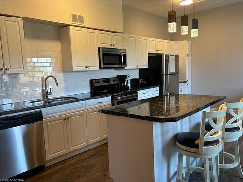 513-198 Scott Street, St. Catharines, ON - Indoor Photo Showing Kitchen With Double Sink