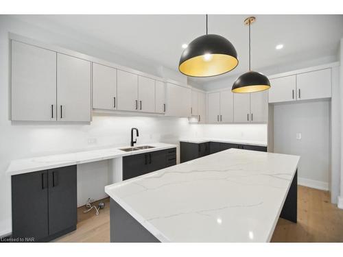 2-300 Richmond Street, Thorold, ON - Indoor Photo Showing Kitchen With Double Sink