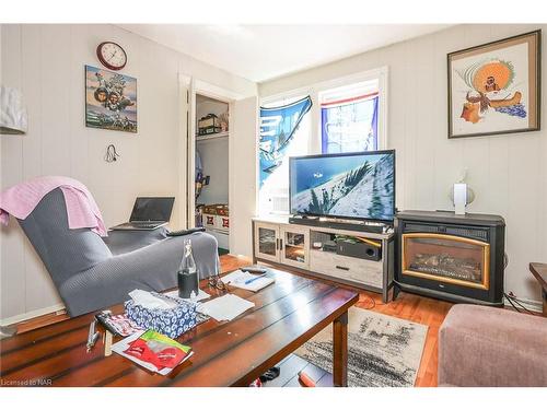 242 Jarvis Street, Fort Erie, ON - Indoor Photo Showing Living Room With Fireplace