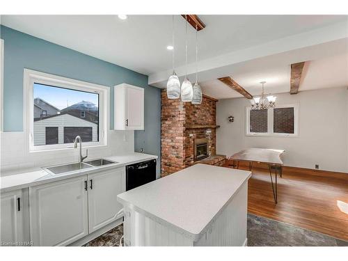 5020 Fifth Avenue, Niagara Falls, ON - Indoor Photo Showing Kitchen With Fireplace With Double Sink