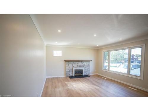 Main-352 Bunting Road, St. Catharines, ON - Indoor Photo Showing Living Room With Fireplace